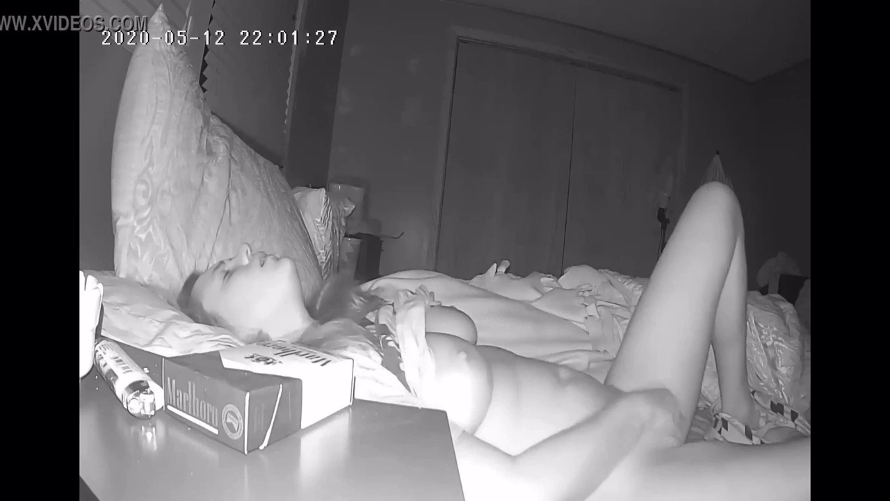 A reserved woman masturbates in her room before bedtime with a concealed camera porn video